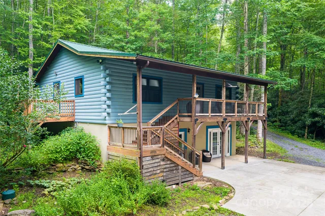 a house with trees in the background