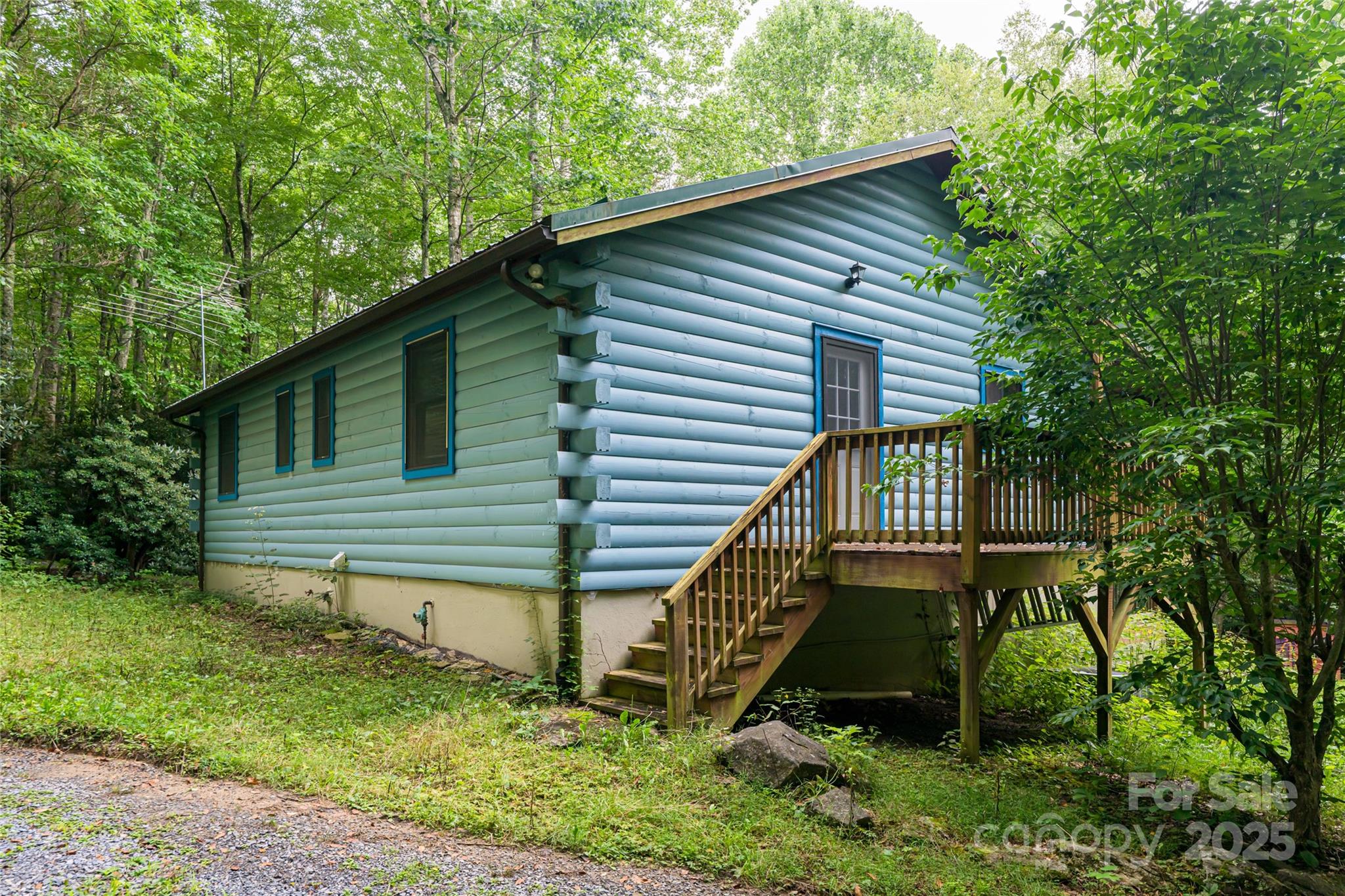 4035 Bald Creek Road Clyde, NC 28721 - Photo 32 of 42 a front view of a house with garden