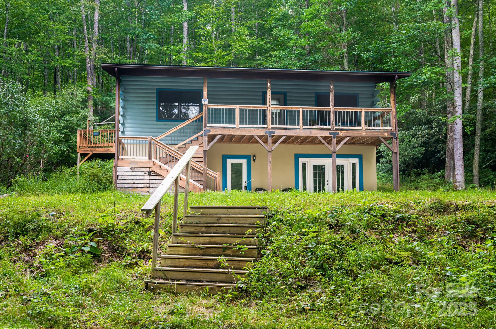 4035 Bald Creek Road Clyde, NC 28721 - Photo 42 of 42 a front view of a house with a yard
