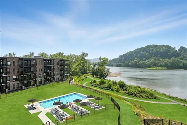 a view of a golf course with a lake