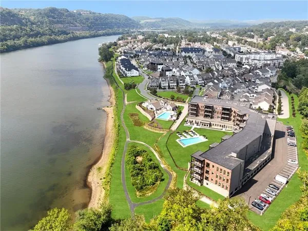 a view of a lake with a big yard