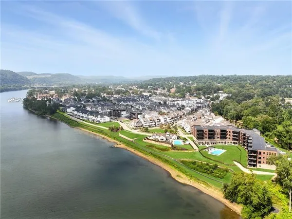 aerial view of a house with a yard