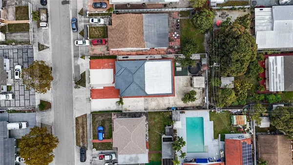 an aerial view of houses and roads
