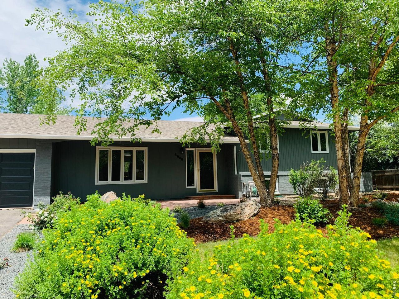 6909 Harvest Road Boulder, CO 80301 - Photo 2 of 32 5BR, 4BA and tons of space, inside and out.
