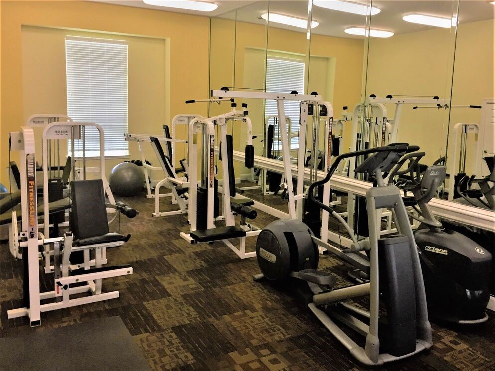 3400 Edloe Street, Unit 318 Houston, TX 77027 - Photo 5 of 13 a view of a room with gym equipment