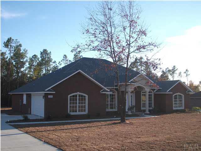 3026 Wallace Lake Road Pace, FL 32571 - Photo 3 of 24 Front of Home with Side-Entry Garage