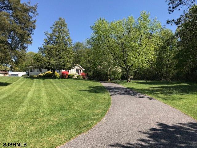 41 Roberts Road Bridgeton, NJ 08302 - Photo 2 of 15 a view of a field with sitting area
