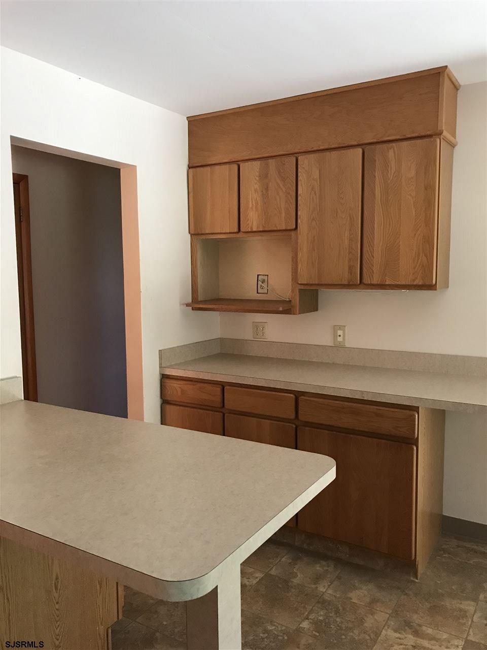 41 Roberts Road Bridgeton, NJ 08302 - Photo 9 of 15 a kitchen with a sink and cabinets