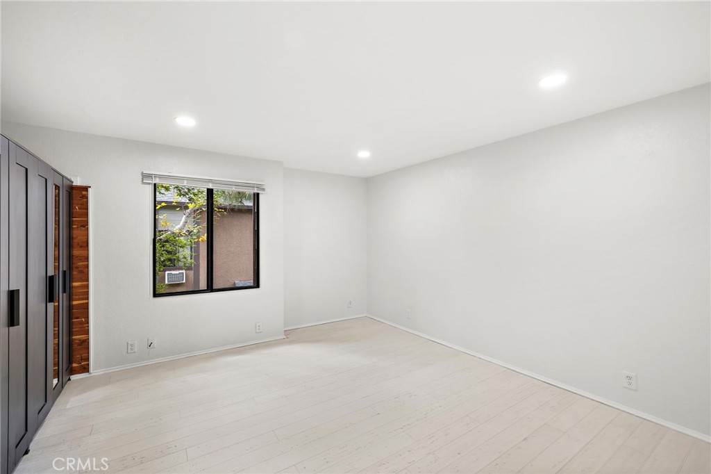 20702 El Toro, Unit 2 Lake Forest, CA 92630 - Photo 11 of 21 an empty room with windows