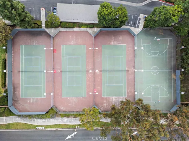 an aerial view of a swimming pool and outdoor space