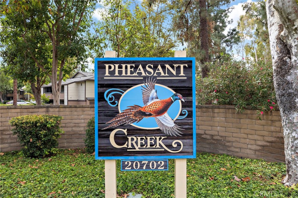 20702 El Toro, Unit 2 Lake Forest, CA 92630 - Photo 21 of 21 a street sign that is on a pole