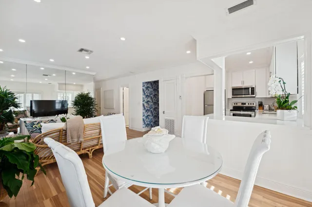 a balcony view with a sitting space