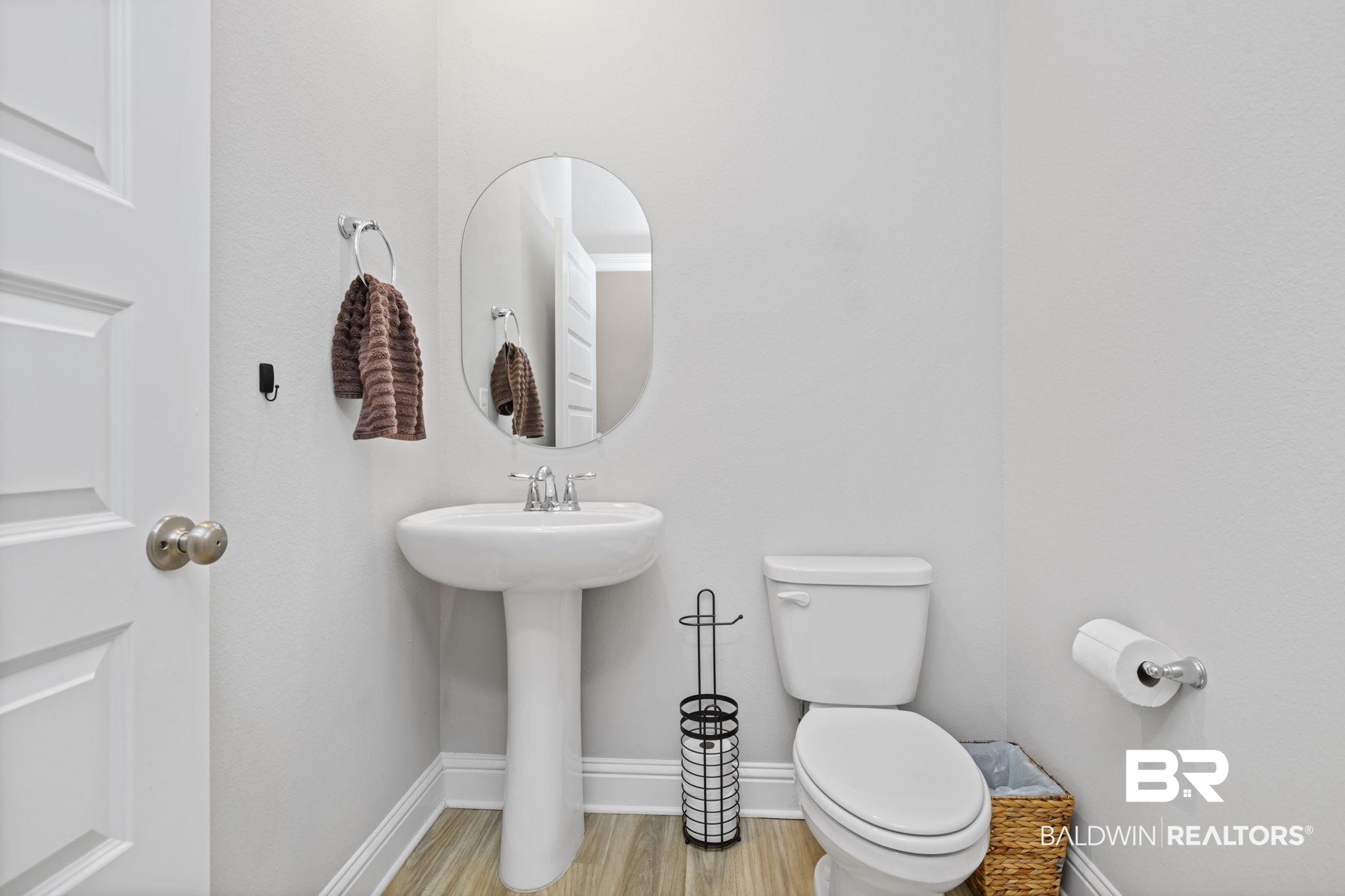 2183 Meadowview Loop Semmes, AL 36575 - Photo 23 of 58 Half bath with baseboards and light wood finished floors