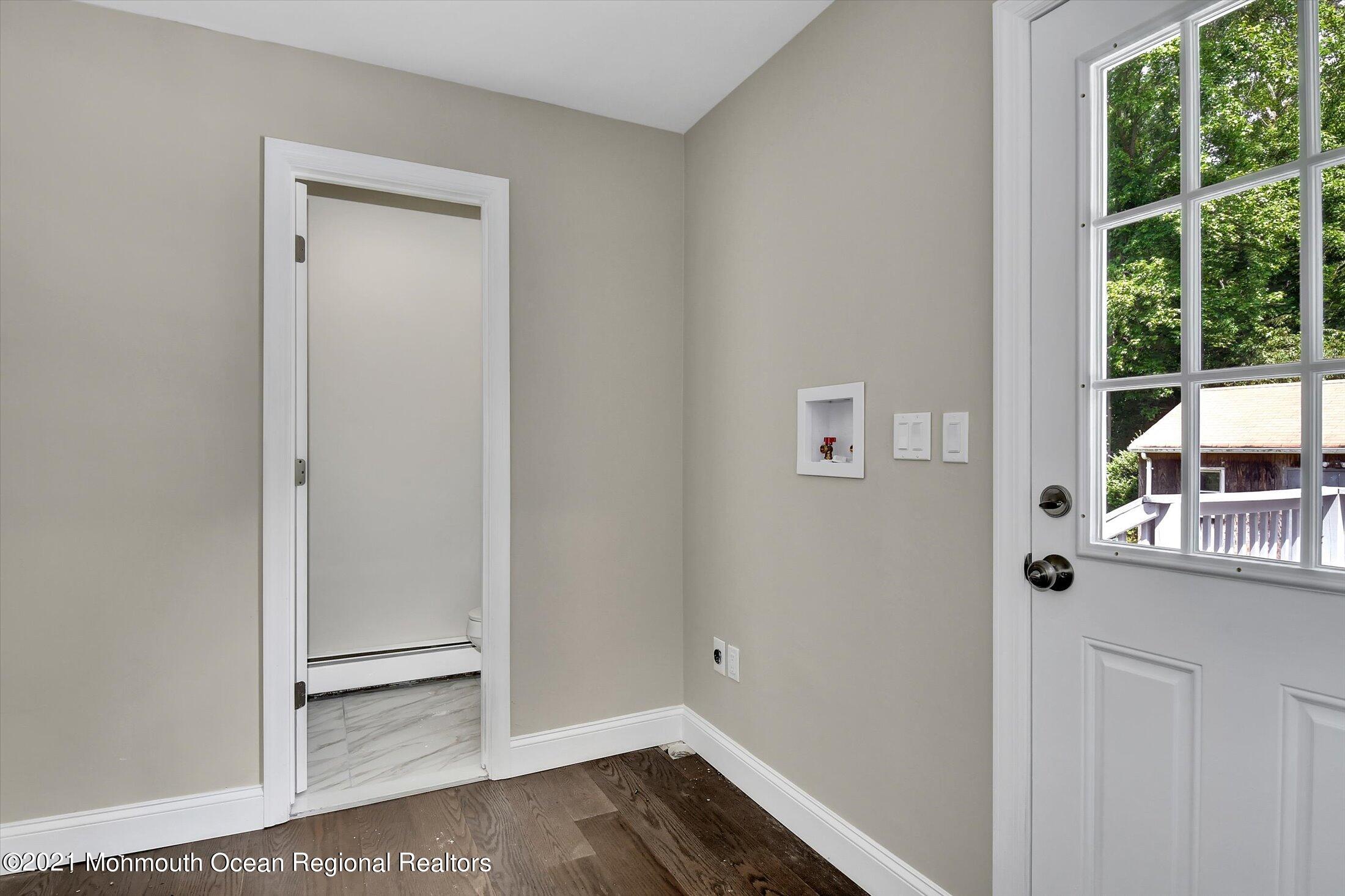 347 Iron Ore Road Manalapan, NJ 07726 - Photo 15 of 27 a view of a room that has a window in it