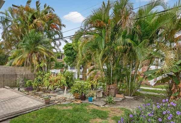 a backyard of a house with lots of green space