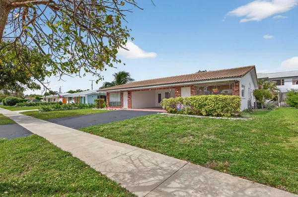 a view of a house with garden