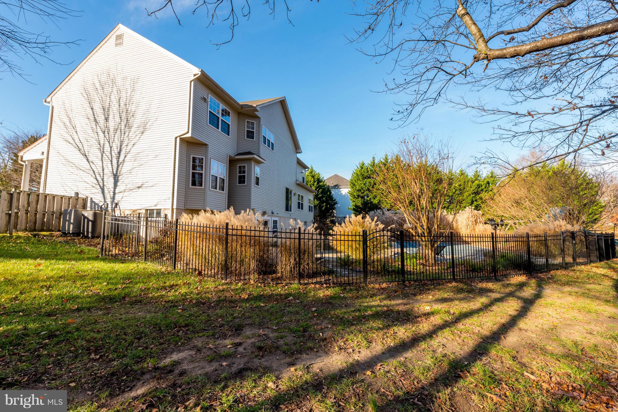 3401 Evans Road Huntingtown, MD 20639 - Photo 26 of 30 a front view of a house with a yard