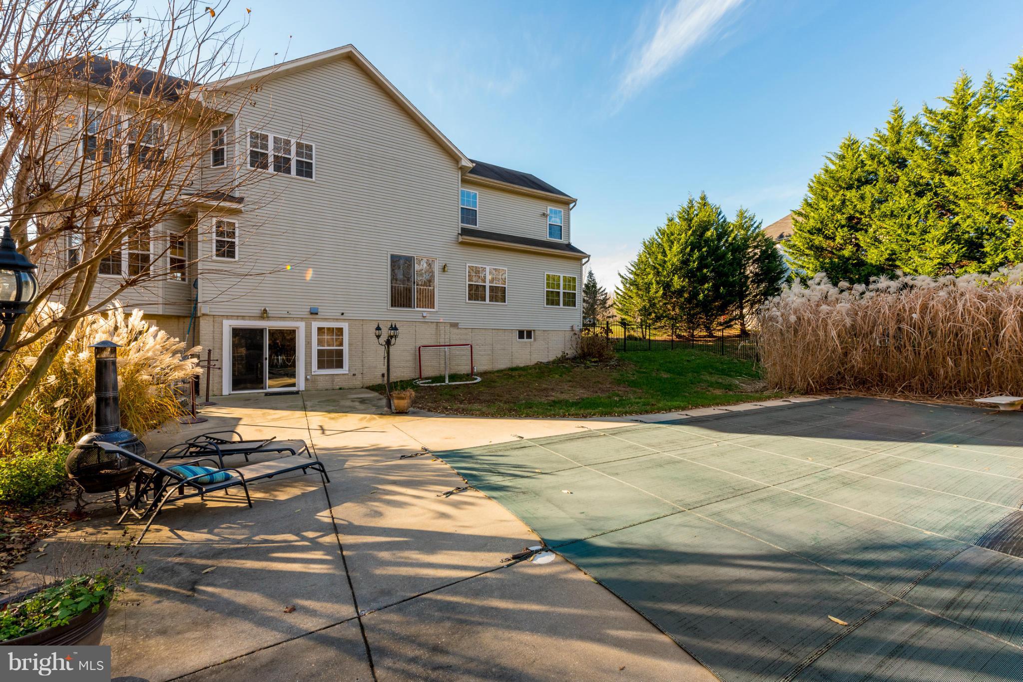 3401 Evans Road Huntingtown, MD 20639 - Photo 28 of 30 a view of a house with a patio