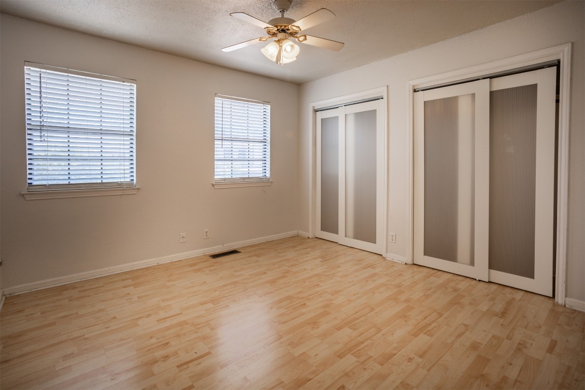 7800 Northcrest Boulevard, Unit 203 Austin, TX 78752 - Photo 14 of 19 a view of an empty room with a window