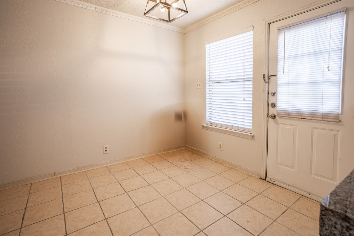 7800 Northcrest Boulevard, Unit 203 Austin, TX 78752 - Photo 18 of 19 a view of an empty room and window