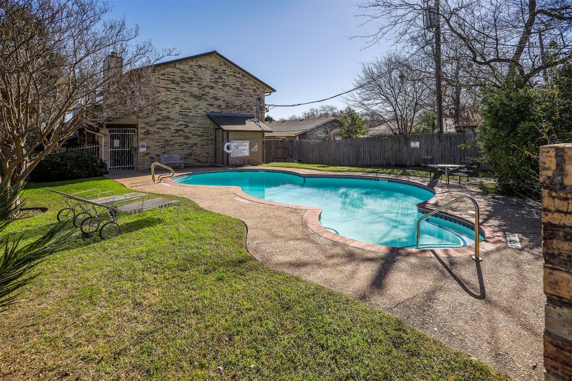 7800 Northcrest Boulevard, Unit 203 Austin, TX 78752 - Photo 19 of 19 a view of a backyard with a garden and entertaining space