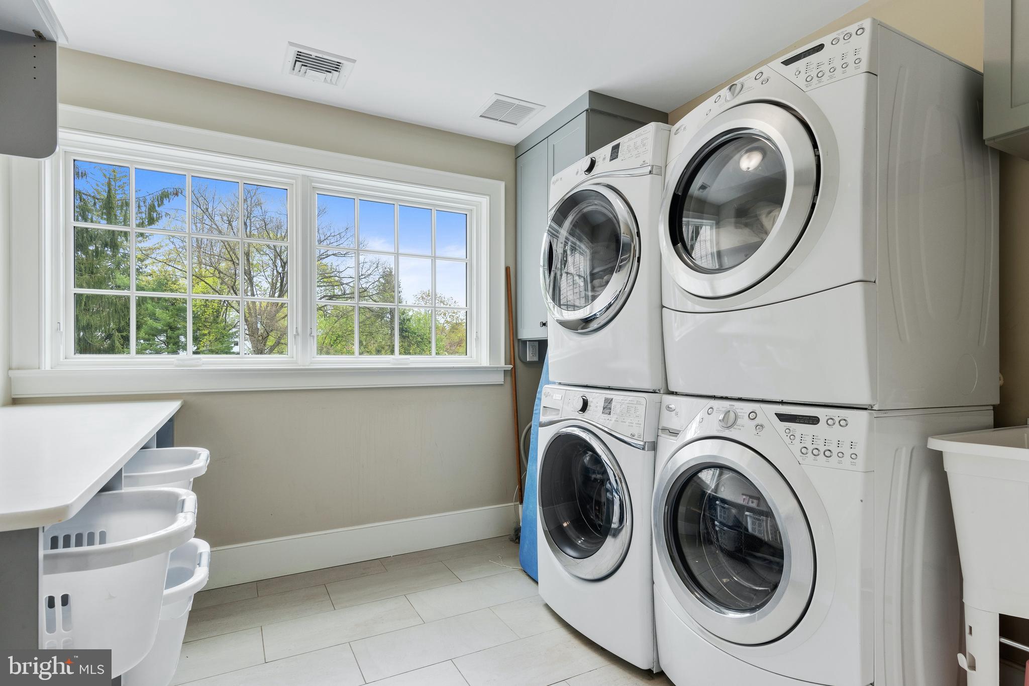 35 Steeplechase Road Devon, PA 19333 - Photo 52 of 64 2nd floor laundry w/ 2 W&D's and lots of cabinetry