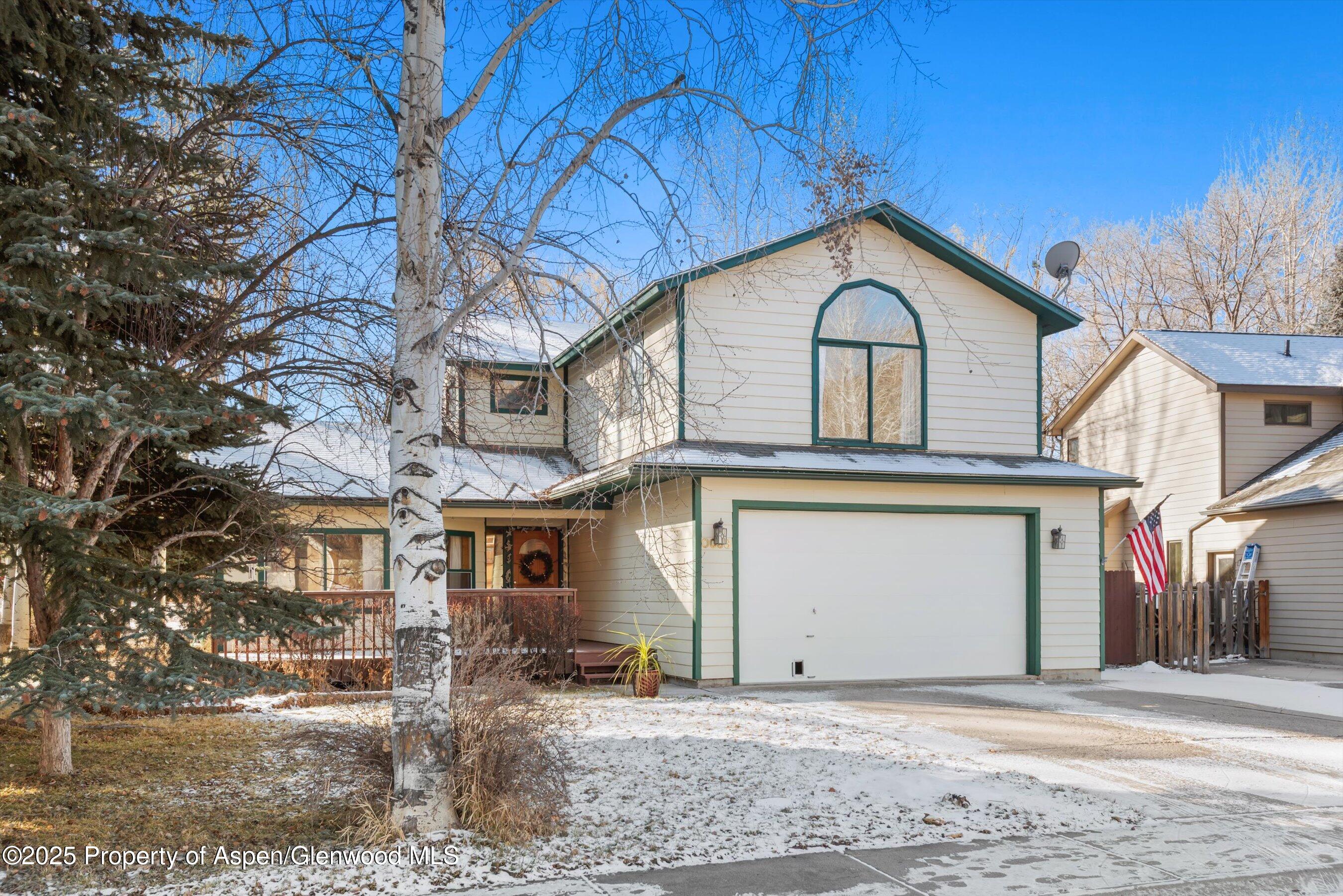 93 Quail Run Carbondale, CO 81623 - Photo 26 of 36 a front view of a house with garden