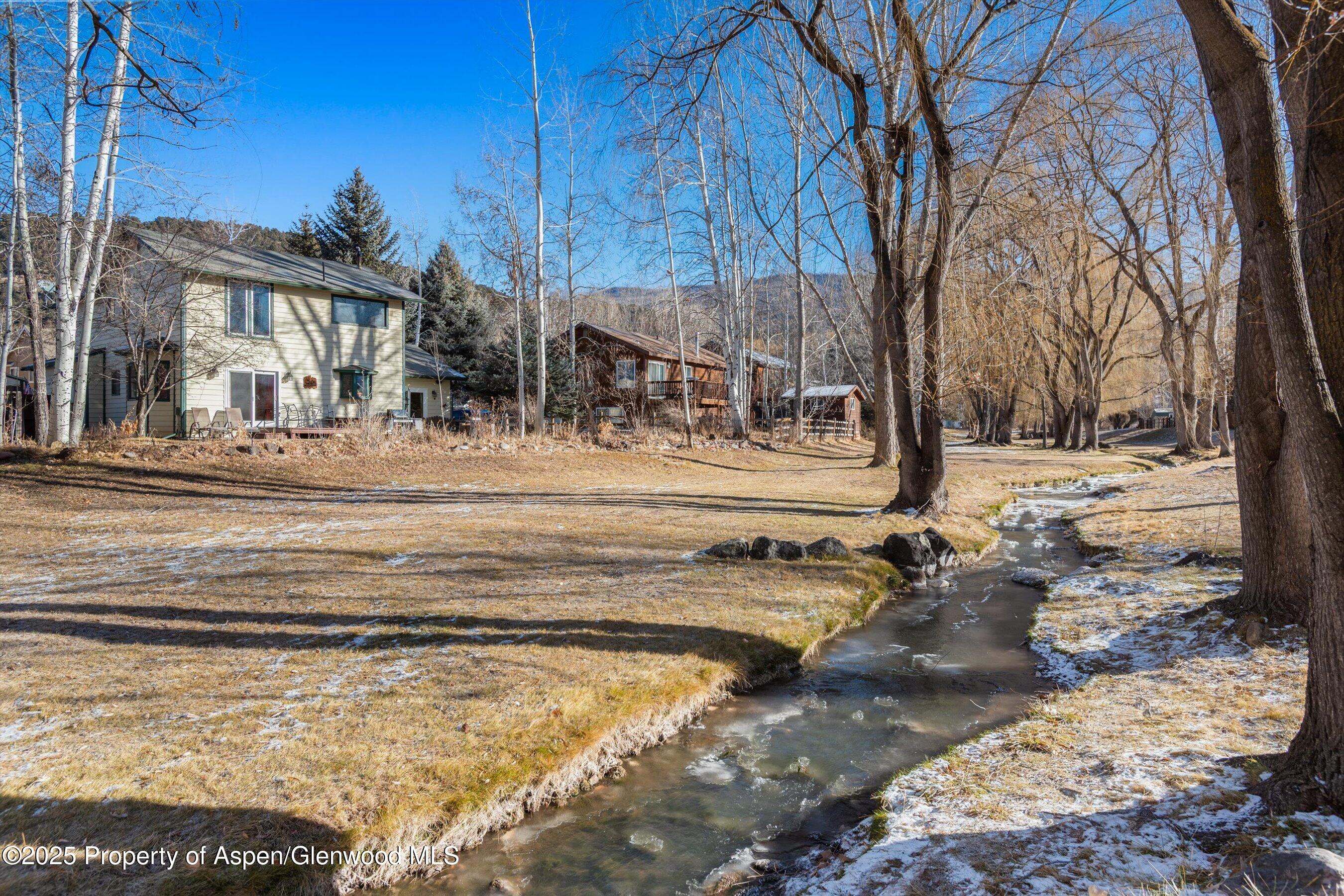 93 Quail Run Carbondale, CO 81623 - Photo 27 of 36 a view of a house with snow on the road