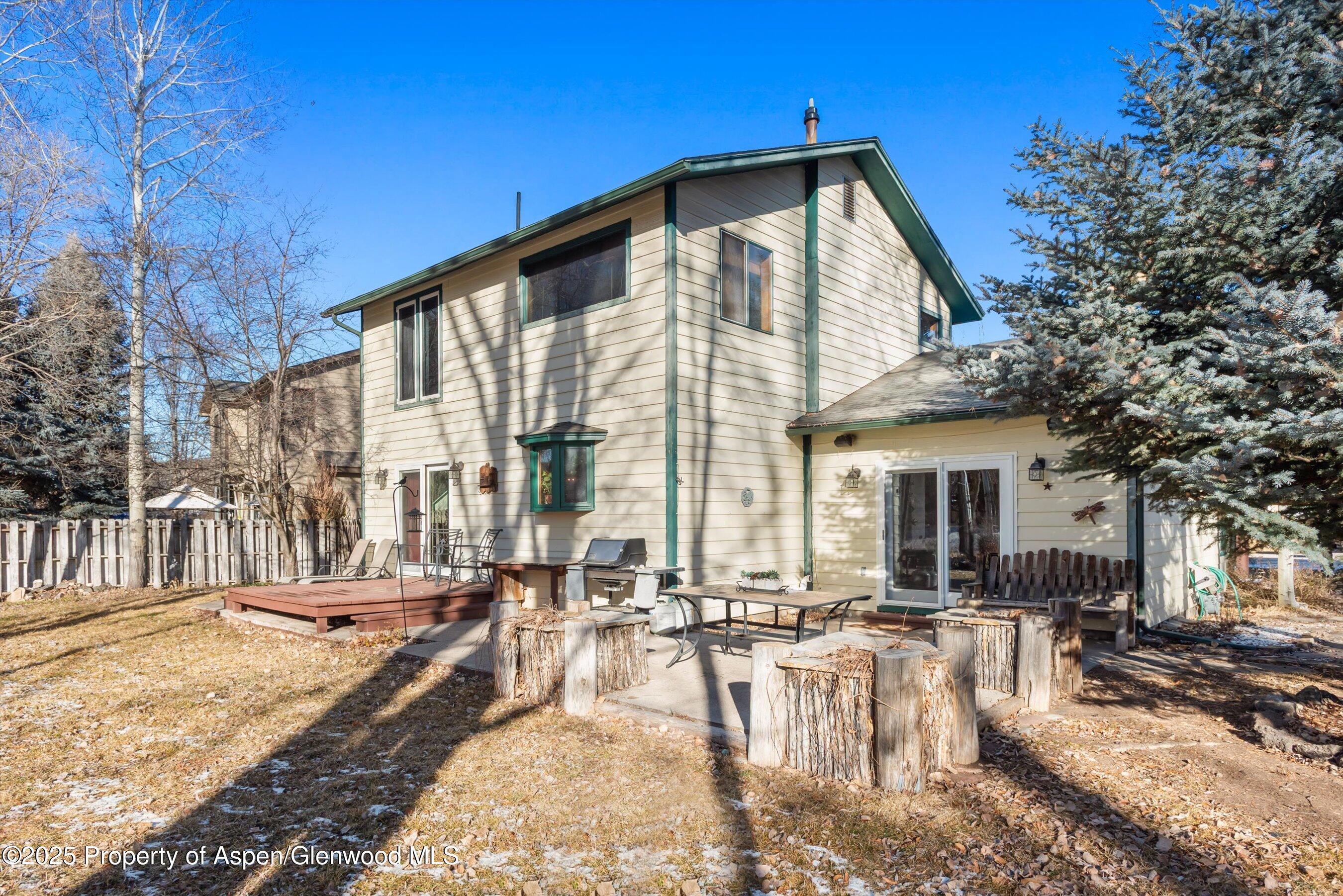 93 Quail Run Carbondale, CO 81623 - Photo 35 of 36 a front view of a house with swimming pool