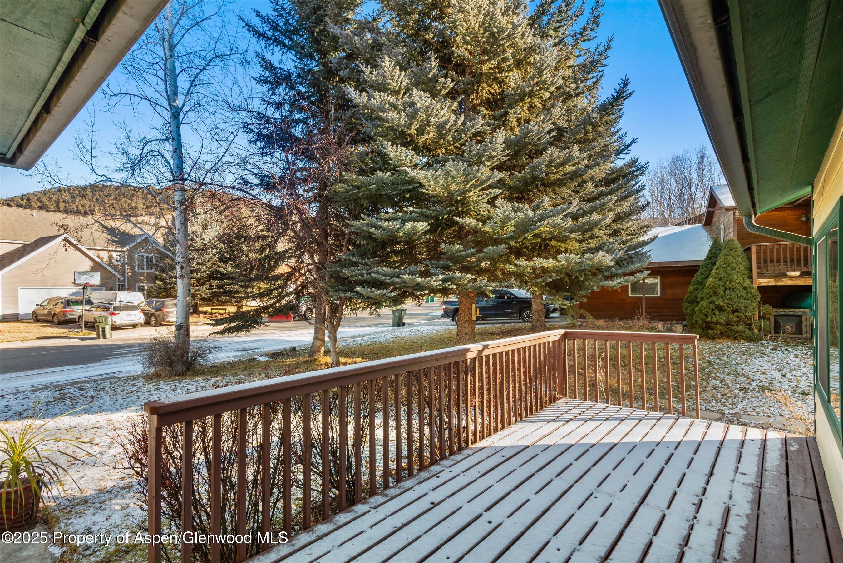 93 Quail Run Carbondale, CO 81623 - Photo 36 of 36 a view of balcony with wooden floor and fence