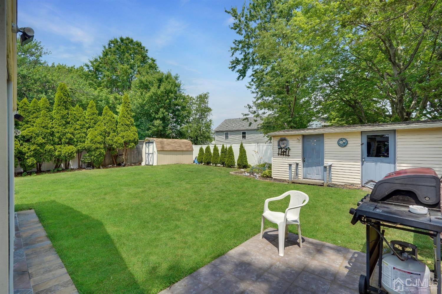 27 Raleigh Road Edison, NJ 08817 - Photo 21 of 29 a view of a backyard with furniture