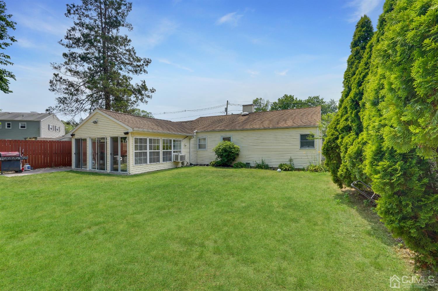 27 Raleigh Road Edison, NJ 08817 - Photo 25 of 29 a view of a house with backyard and garden