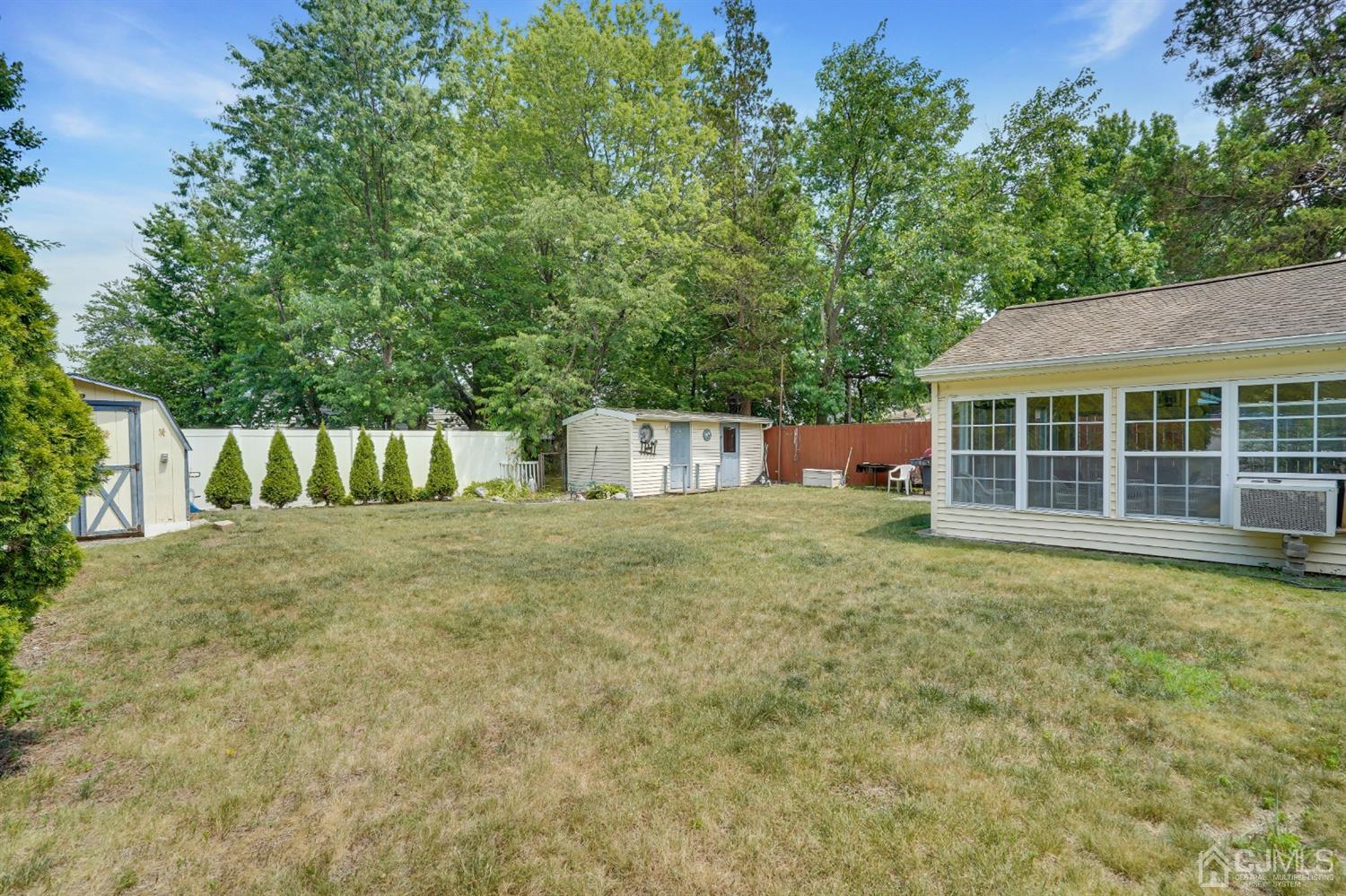 27 Raleigh Road Edison, NJ 08817 - Photo 26 of 29 a view of a house with backyard and garden