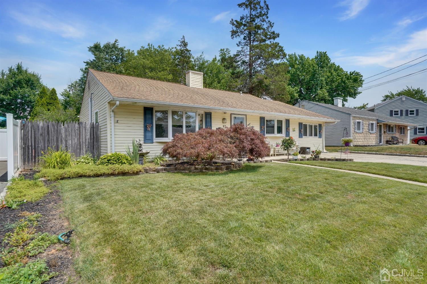 27 Raleigh Road Edison, NJ 08817 - Photo 27 of 29 a house view with swimming pool and garden space