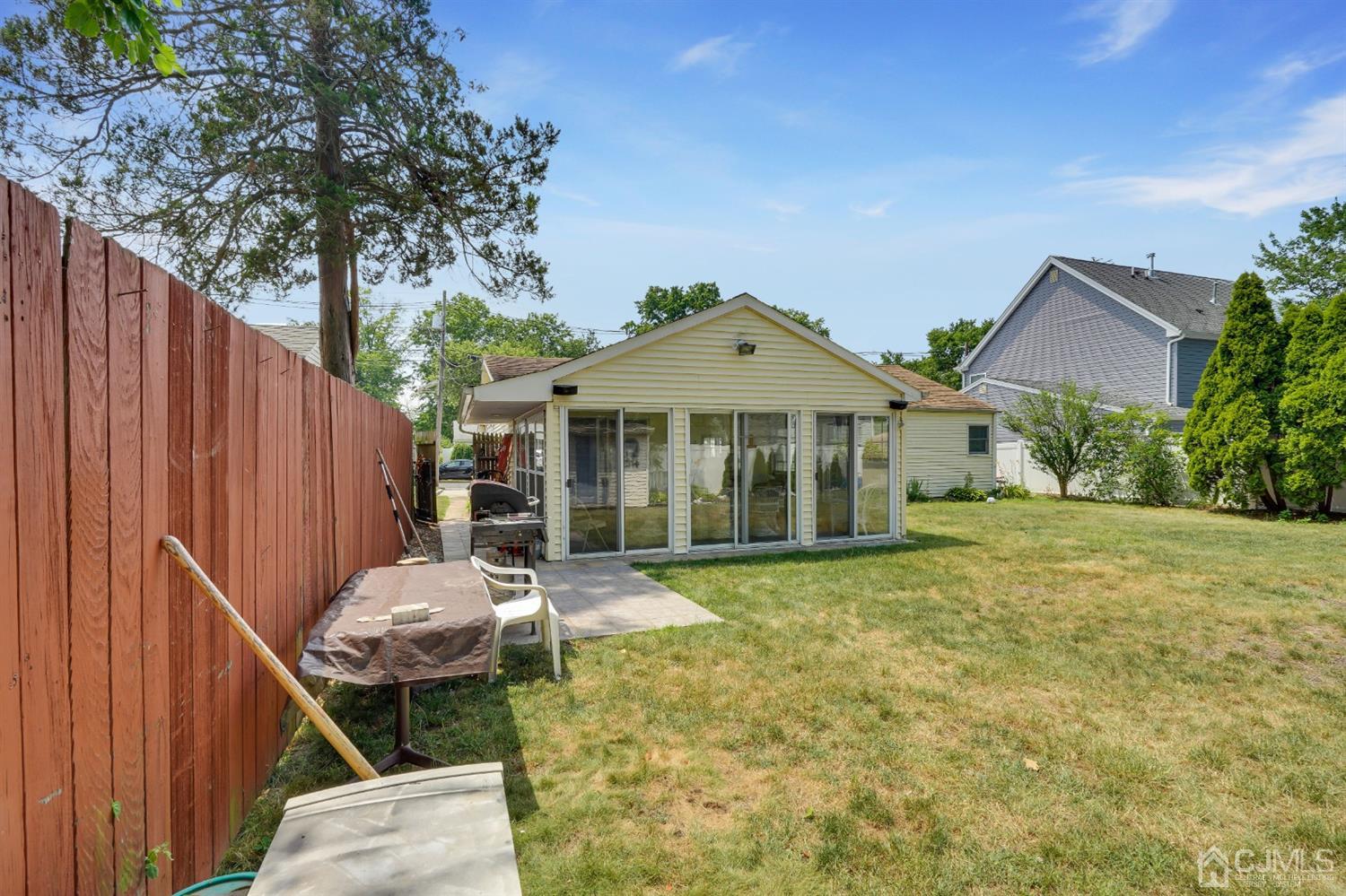 27 Raleigh Road Edison, NJ 08817 - Photo 29 of 29 a view of a house with backyard and sitting area
