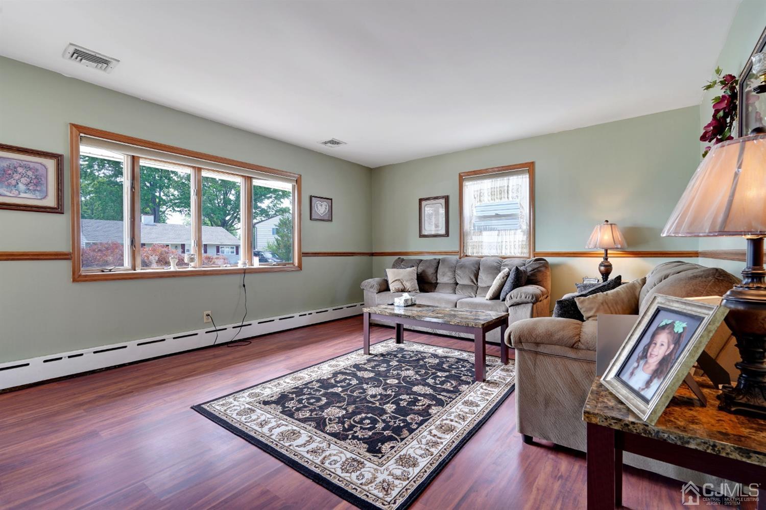 27 Raleigh Road Edison, NJ 08817 - Photo 5 of 29 a living room with furniture rug and window