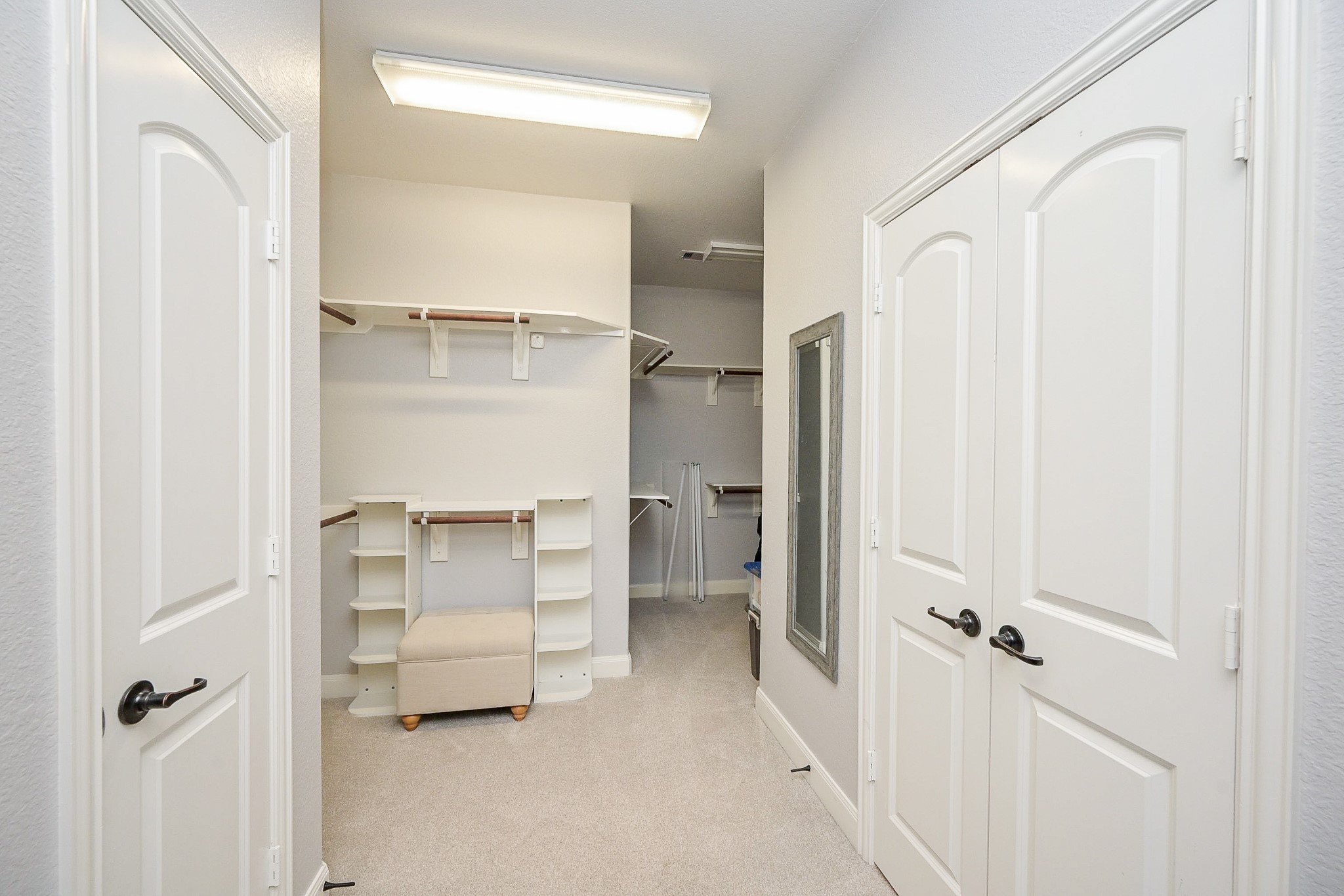 11 South Victoriana Circle Spring, TX 77389 - Photo 24 of 38 a view of walk in closet with empty racks