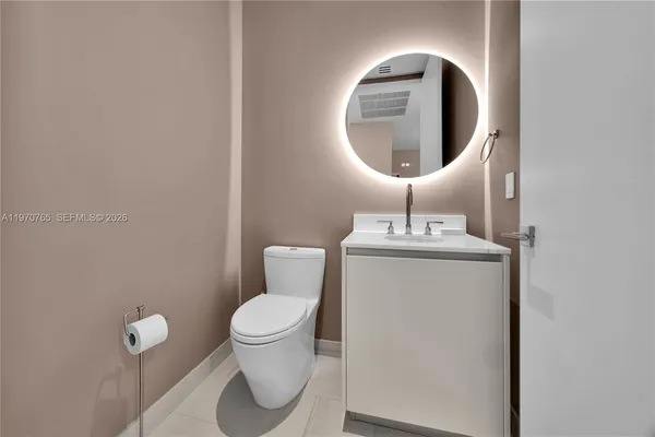 a view of a hallway with washer and dryer