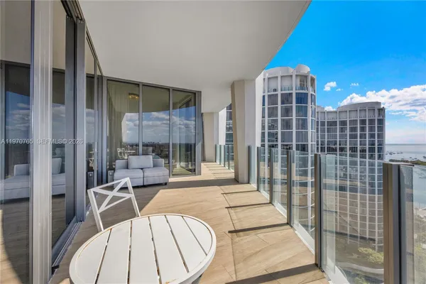 a view of a city with an ocean view