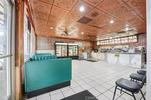 a view of a living room and a wooden floor