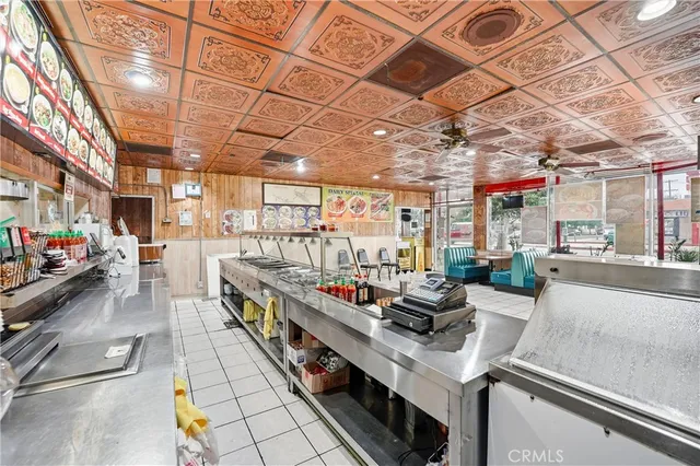 a kitchen that has a lot of cabinets in it