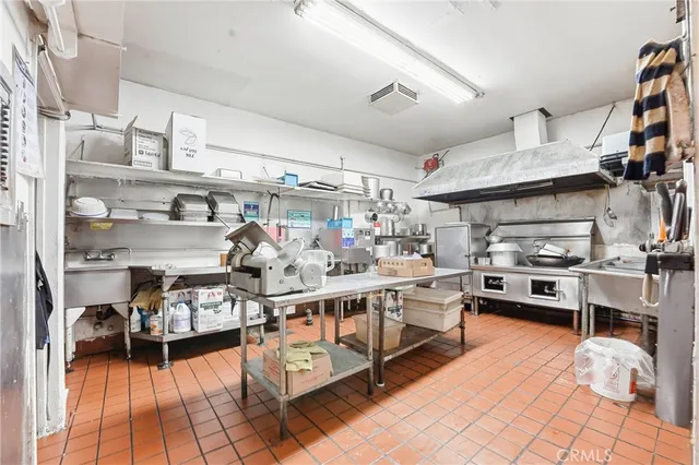 a bathroom with a sink toilet and a mirror