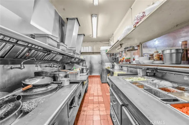 a bathroom with a sink toilet and a mirror