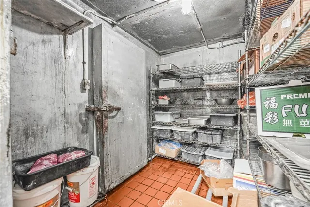 a storage room with washer and dryer