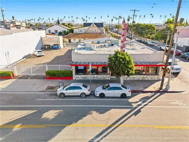 a view of a patio with a table and chairs