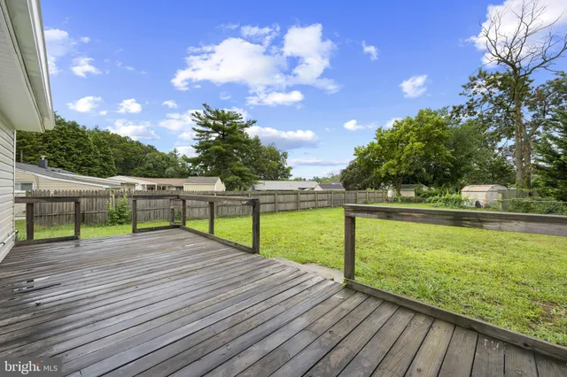 a view of ocean with a yard