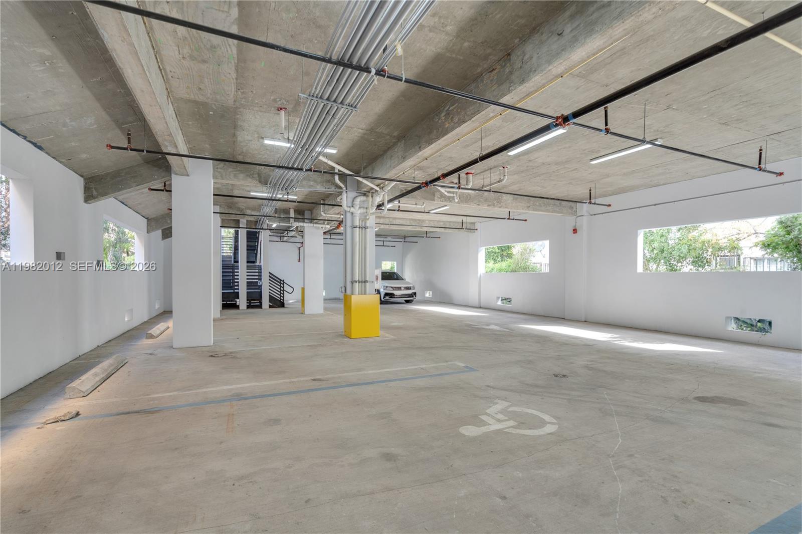 1037 Northwest 2nd Street, Unit 2B2 Miami, FL 33128 - Photo 10 of 15 a view of a garage