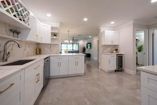 a bathroom with a toilet sink and shower