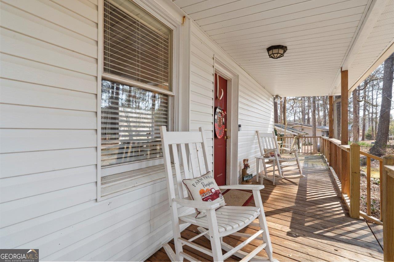 109 Horseshoe Bend Road Southwest Eatonton, GA 31024 - Photo 2 of 42 a view of balcony deck and patio