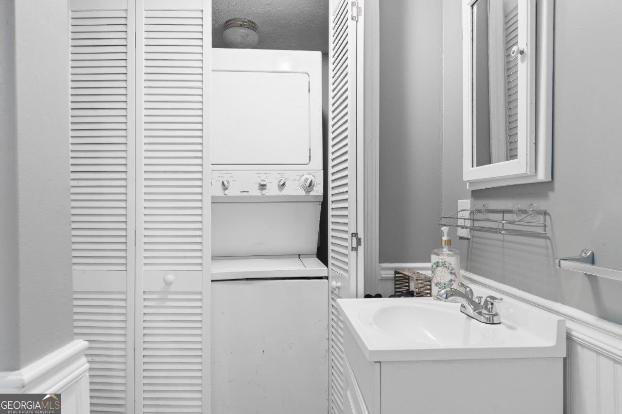 109 Horseshoe Bend Road Southwest Eatonton, GA 31024 - Photo 28 of 42 a bathroom with a sink and a mirror